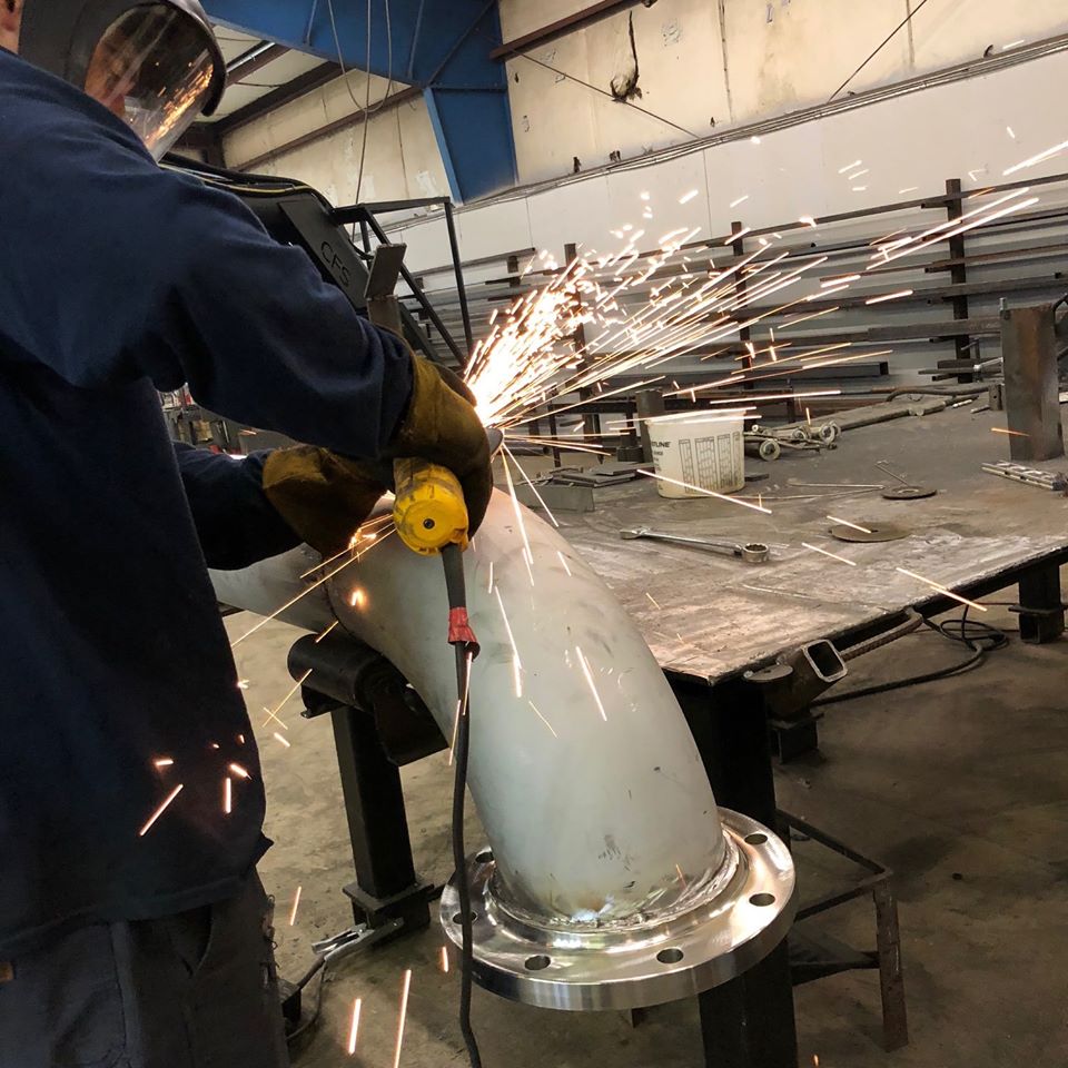 custom risers being welded